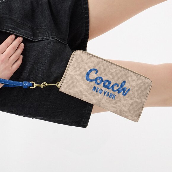Long Zip Around Wallet In Signature Canvas With Coach Graphic - Picture 1 of 3